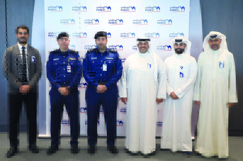 KUWAIT: Representatives from the Public Relations and Media Department of Kuwait Fire Force Lt Col Rashed Al-Helfi and Major Yaser Al-Haje are seen during their visit to NBK.n