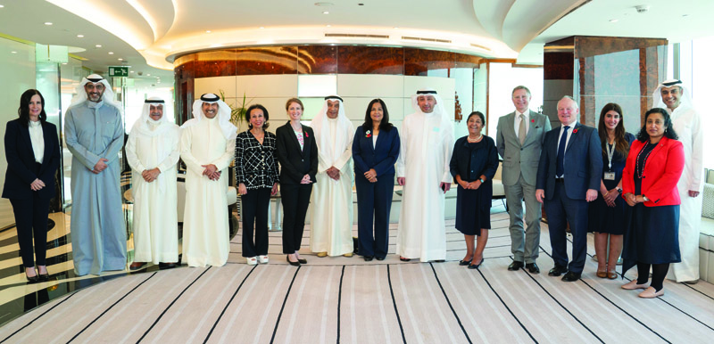 KUWAIT: A group photo taken during the Kuwait-British Friendship Society's luncheon in honor of a group of visiting British parliamentarians.n