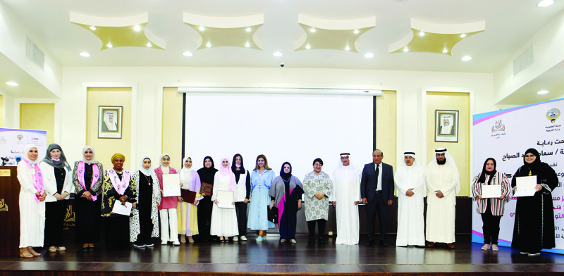 KUWAIT: A group photo taken during an event organized by Cancer Aware Nation (CAN) at the Kuwait Writers Association. - Photo by Yasser Al-Zayyatn