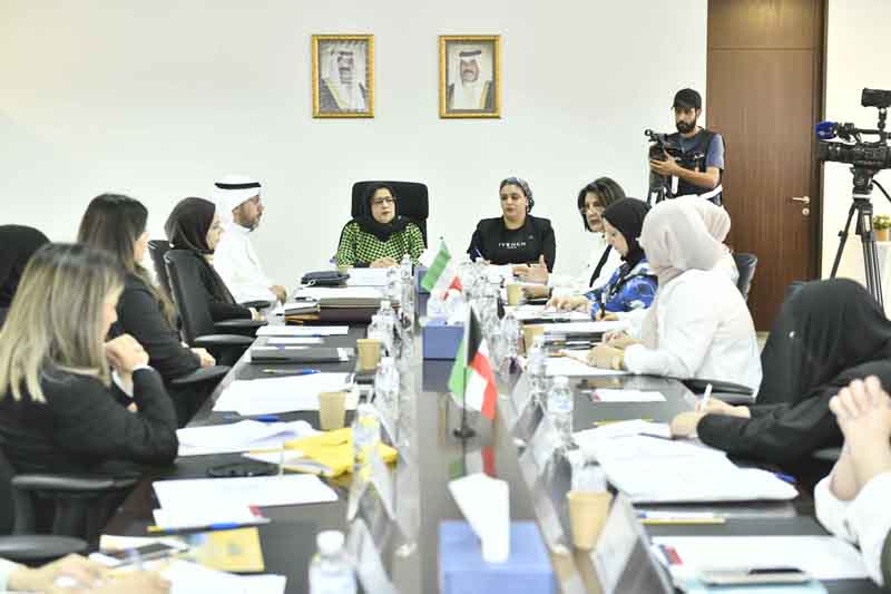 KUWAIT: Members of the Family Rights Committee of the National Diwan for Human Rights attend the seminar. - KUNAn