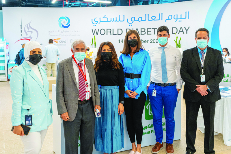 KUWAIT: Officials pose for a group photo during a diabetes awareness event hosted at Al-Hamra Shopping Center.n