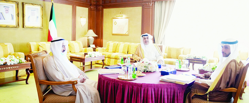 KUWAIT: Speaker of the National Assembly Marzouq Al-Ghanem, President of the Supreme Court and Chairman of the Court of Cassation Justice Ahmad Al-Ajeel, and Acting Prime Minister and Minister of Defense Sheikh Hamad Jaber Al-Ali Al-Sabah meet at Seif Palace yesterday. - Amiri Diwan photon