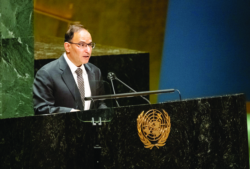 NEW YORK: Kuwait's UN permanent representative Ambassador Mansour Al-Otaibi speaks on behalf of the Arab Group before the UN General Assembly. - KUNAn