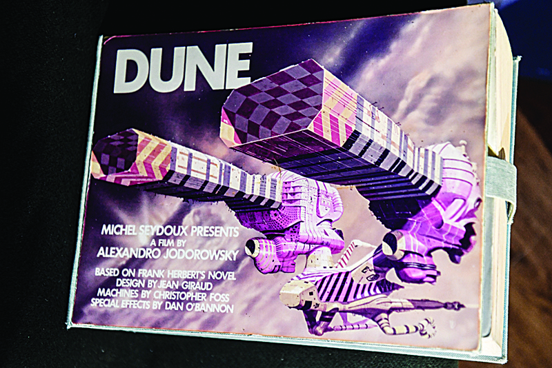 One of the ten Alejandro Jodorowsky's epic 1970 Dune storyboard copies is displayed to the public three days before an auction at Christie's Paris gallery.-AFP n
