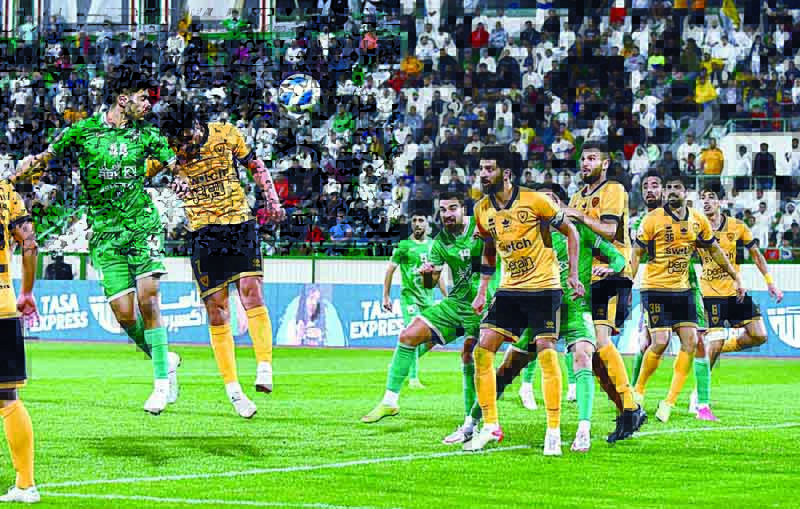 KUWAIT: Al-Arabi's Hassan Hamdan #44 heads a shot against Qadisiya during the two teams' Kuwait Premier League match on Saturday. - KUNAn
