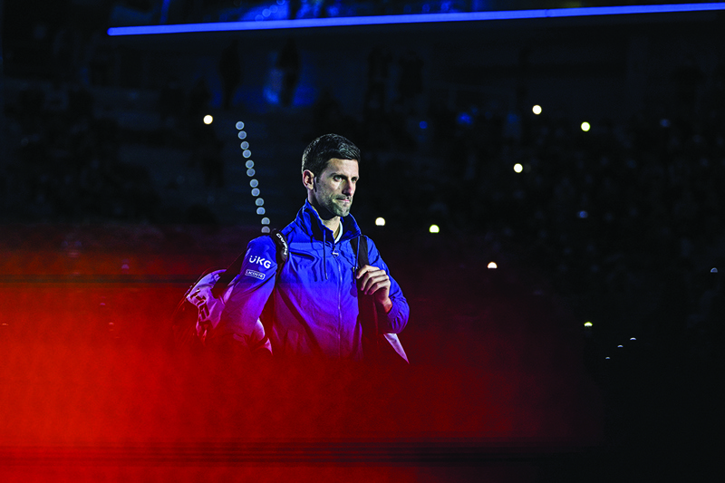 TURIN: Serbia's Novak Djokovic arrives for his first-round singles match of the ATP Finals against Britain's Cameron Norrie at the Pala Alpitour venue in Turin on Friday. – AFPn