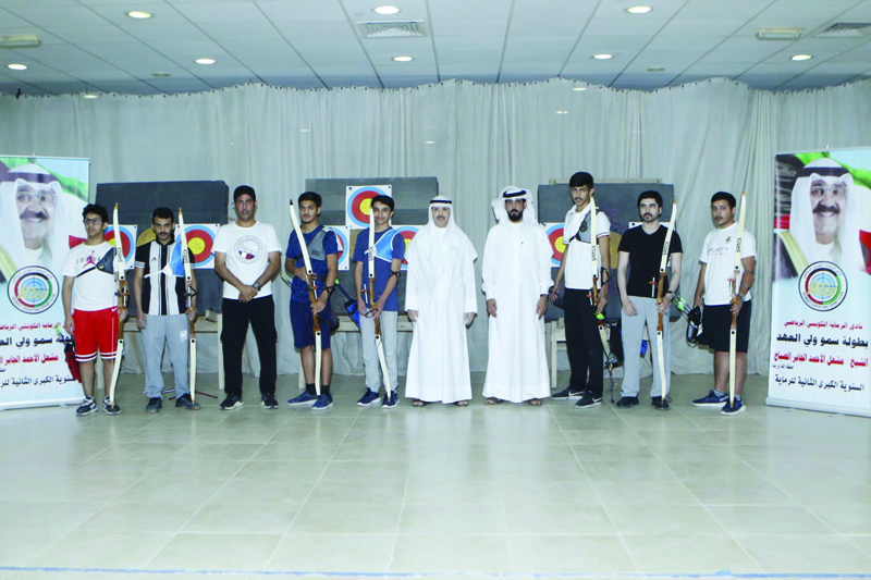 KUWAIT: Participants in the junior's archery competition during HH the Crown Prince Sheikh Shooting Tournament are seen in a group photo.n