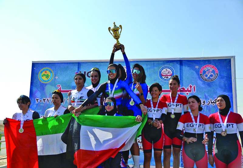 CAIRO: Kuwait's national women's cycling team (center) poses on the podium yesterday after winning the time category during the Arab Championship.n