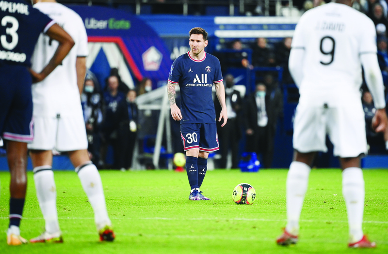 PARIS: Paris Saint-Germain's Argentinian forward Lionel Messi reacts during the French L1 football match against Lille at the Parc des Princes stadium, in Paris, on Friday. - AFPn