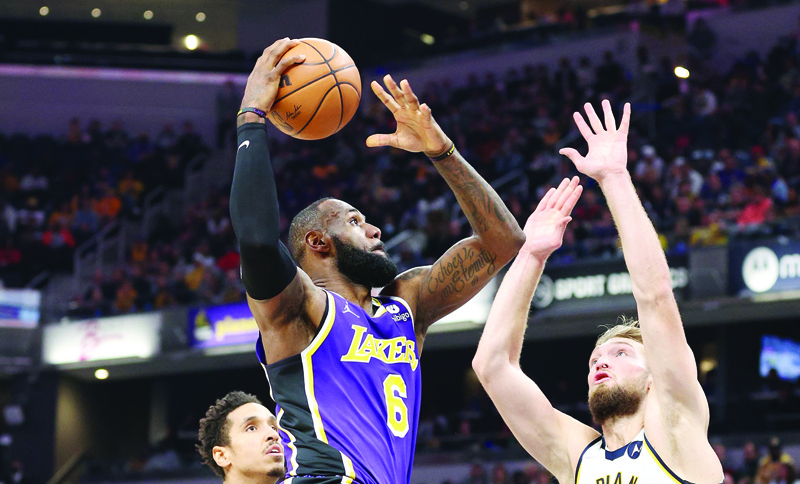 INDIANAPOLIS: LeBron James #6 of the Los Angeles Lakers shoots the ball against the Indiana Pacers at Gainbridge Fieldhouse on November 24, 2021 in Indianapolis, Indiana. - AFPnnnn