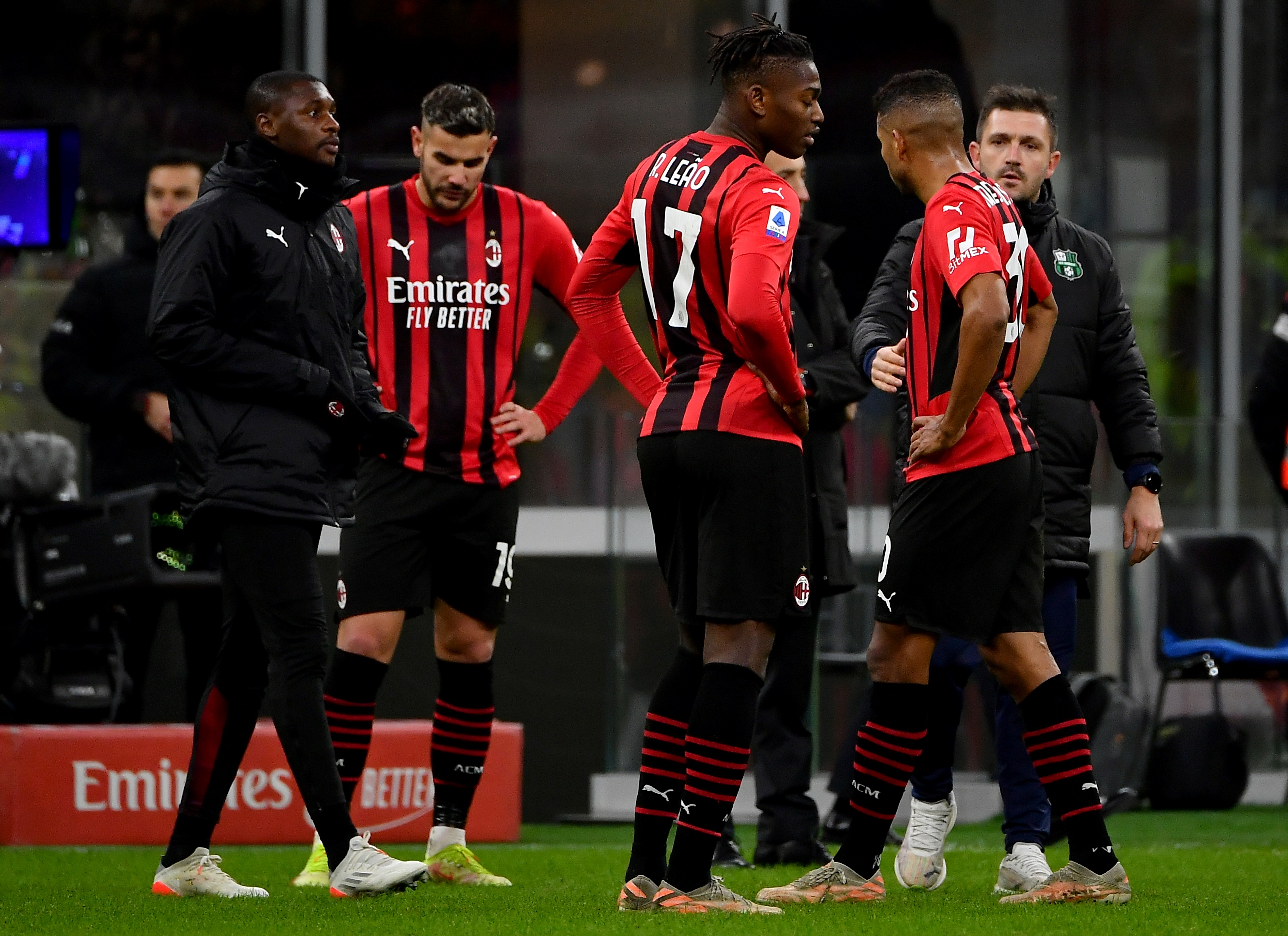 MILAN: AC Milan players react at the end of their match against Sassuolo at the San Siro stadium in Milan yesterday. - AFPn