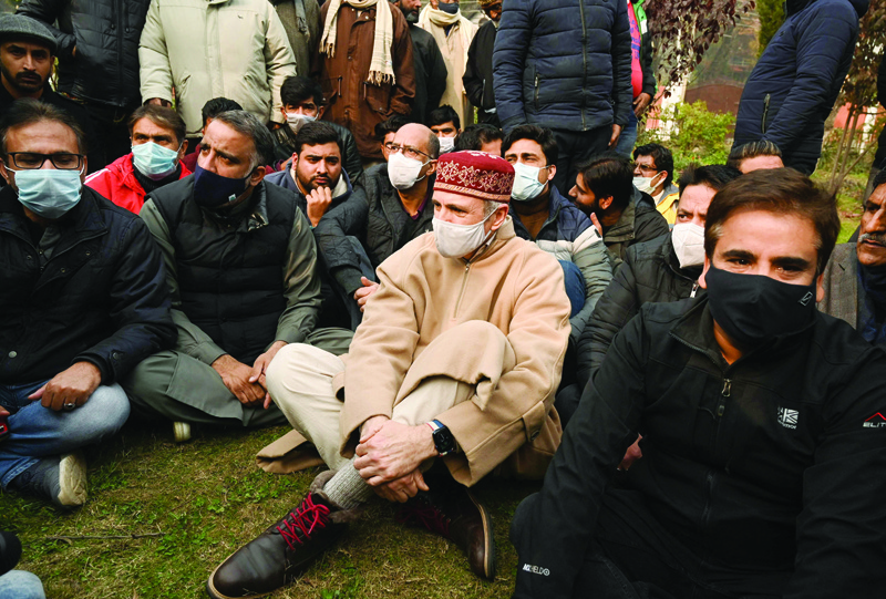 SRINAGAR: Former chief minister Omar Abdullah sits during a protest to demand justice for the recent killings of two civilians who died during a security operation by government forces, in Srinagar yesterday. – AFPnnn