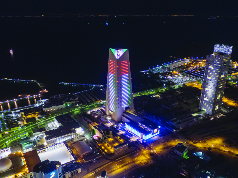 KUWAIT: This handout photo provided by the Central Bank of Kuwait on Wednesday shows the bank's headquarter building lit up with the United Arab Emirates' flag colors in celebration of the UAE's 50th national day.nn