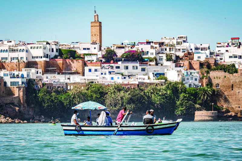 RABAT: A boatman transports passengers across the Bou Regreg river near the Oudaya Kasbah between the city of Sale and Morocco's capital Rabat. - AFP n