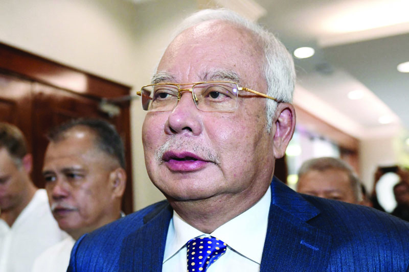 KUALA LUMPUR: File photo taken on August 19, 2019 shows Malaysia's former prime minister Najib Razak arriving at the Kuala Lumpur High Court for his trial over 1MDB corruption allegations in Kuala Lumpur. – AFPnnnn