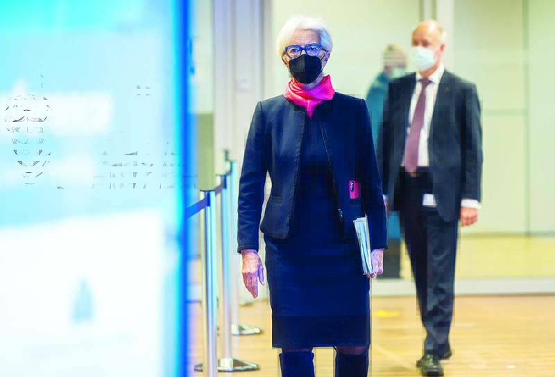 FRANKFURT: European Central Bank (ECB) President Christine Lagarde (left) arrives to address a press conference following a meeting of the governing council of the ECB on the eurozone monetary policy in Frankfurt am Main, western Germany. — AFP