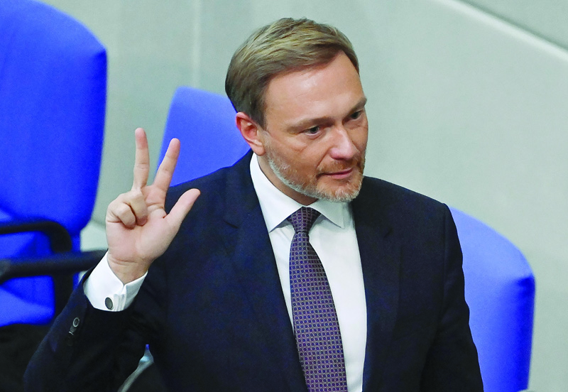 BERLIN: New German Finance Minister Christian Lindner gestures as he takes the oath from the President of the Bundestag (lower house of parliament) during a session at the Bundestag in Berlin.-AFPnn