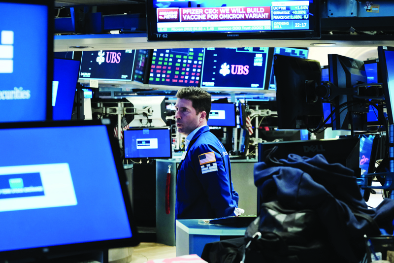 NEW YORK: A trader works on the floor of the New York Stock Exchange (NYSE) at the start of trading in New York. -AFPnnn