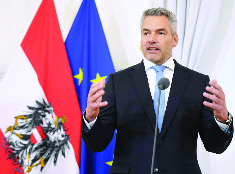 VIENNA: Newly appointed Austria's Chancellor Karl Nehammer gives a press statement during a handover ceremony at the Chancellery in Vienna, Austria yesterday. - AFPnn