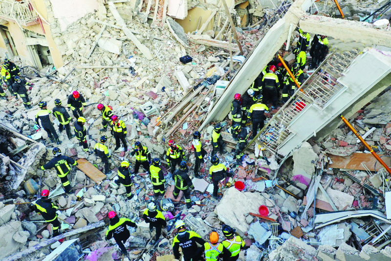 Ravanusa, Italy : This handout picture taken and released by Italian Firefighters (Vigili del Fuoco) on December 12, 2021 shows a four-storey apartment building collapsed, following a gas explosion, in Ravanusa on December 12, 2021. Two people were killed and seven were missing after an explosion caused a four-storey apartment building to collapse on the Italian island of Sicily. - AFPn