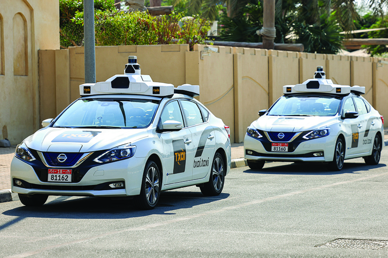ABU DHABI: This picture taken on Nov 30, 2021 shows a view of some of the self-driving taxis being used in a tech demonstration in the UAE capital to transport passengers to the nearby Yas Island. - AFP n