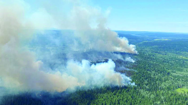 This handout photo courtesy of BC Wildfire Service shows a wildfire southwest of Deka Lake, British Columbia.- AFPn