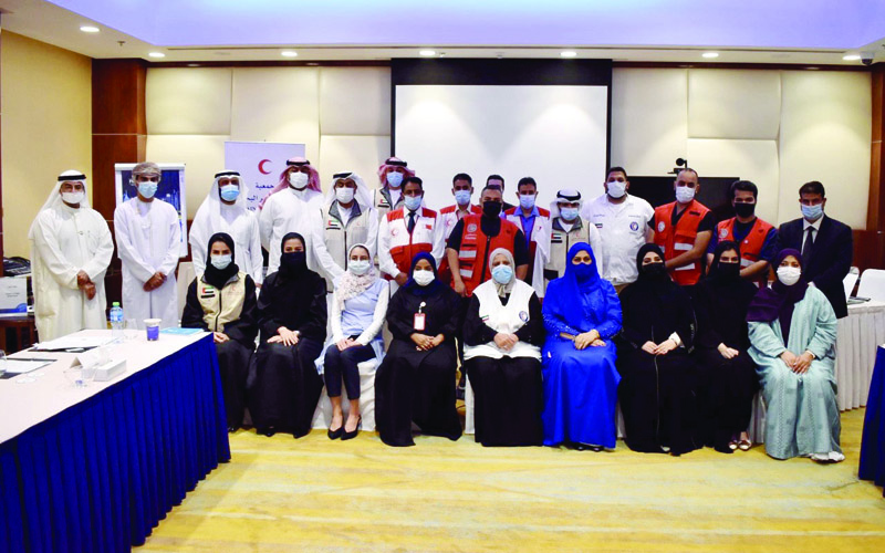 MANAMA: Representatives of Gulf Arab Red Crescent Societies pose for a group picture during the meeting. - KUNAn