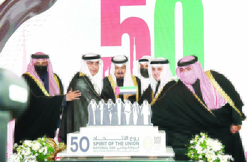 KUWAIT: Top Kuwaiti officials join UAE Ambassador to Kuwait Dr Matar Hamed Al-Neyadi in cutting the cake during the ceremony. - Photos by Yasser Al-Zayyatnn