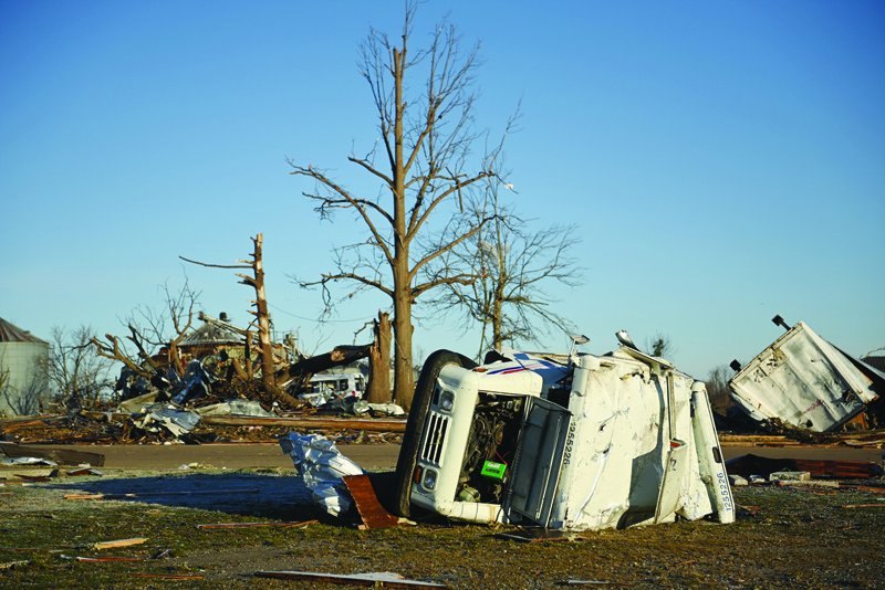 MAYFIELD: Tornado damage is seen yesterday after extreme weather hit the region in Mayfield, Kentucky. - AFPn