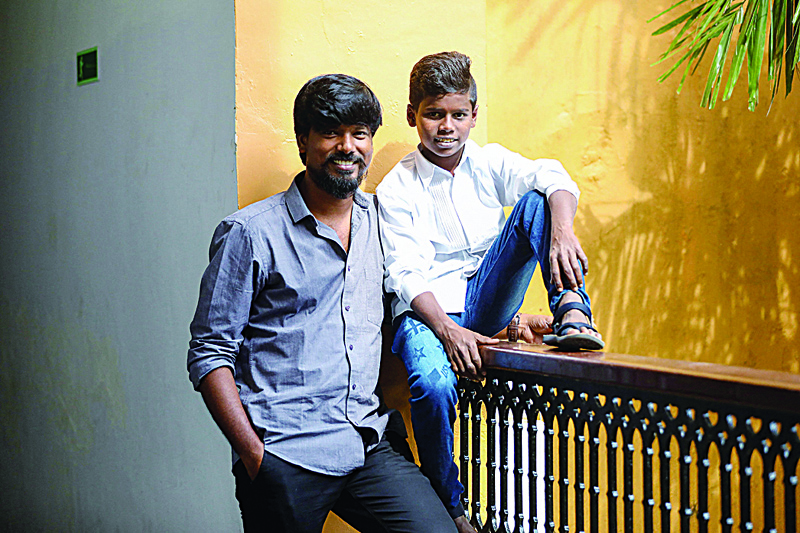 Tamil film director PS Vinothraj (left) poses with actor Chellappandi during the 52nd International Film Festival of India in Panaji. PS Vinothraj's low-budget debut movie 'Koozhangal' - internationally known by its translated title 'Pebbles' - has been selected as India's entry to the international feature film category at next year's Oscars. - AFP n