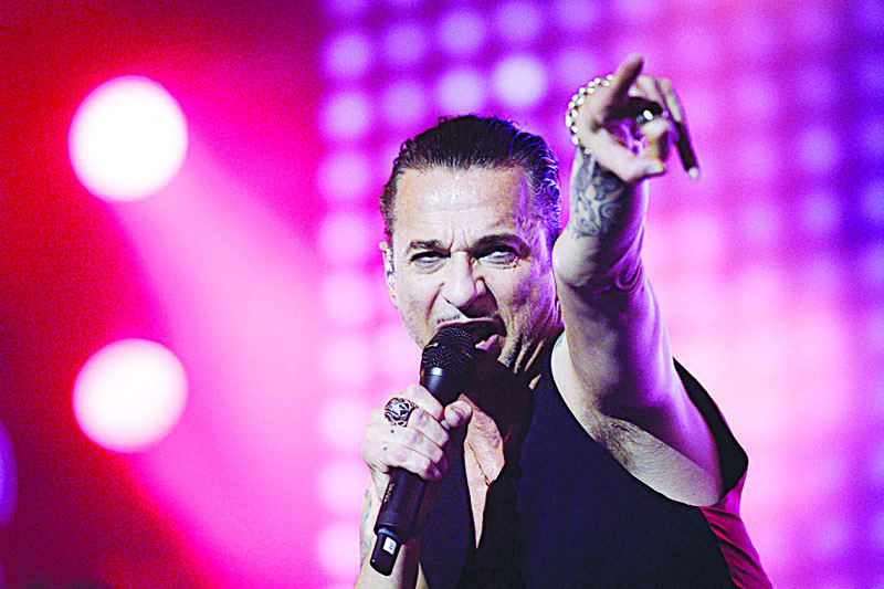 In this file photo, lead singer of the English electronic band Depeche Mode, Dave Gahan, performs at the 43rd Paleo music festival in Nyon, western Switzerland. - AFP n