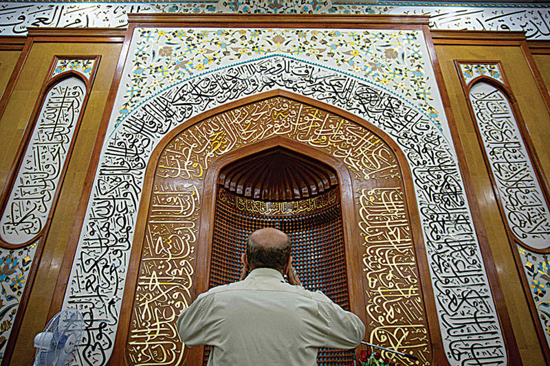 nVerses from the Quran written in Thuluth script, a style of Islamic calligraphy and a style of Arabic calligraphy decorate the Musawi Grand Mosque in Iraq's southern city of Basra. - AFP