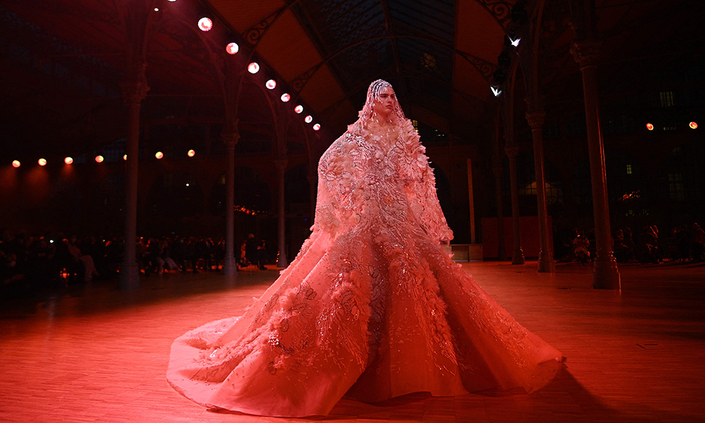 Models present creations by Elie Saab during the Spring-Summer 2022 Haute Couture collection fashion show in Paris. — AFP photos