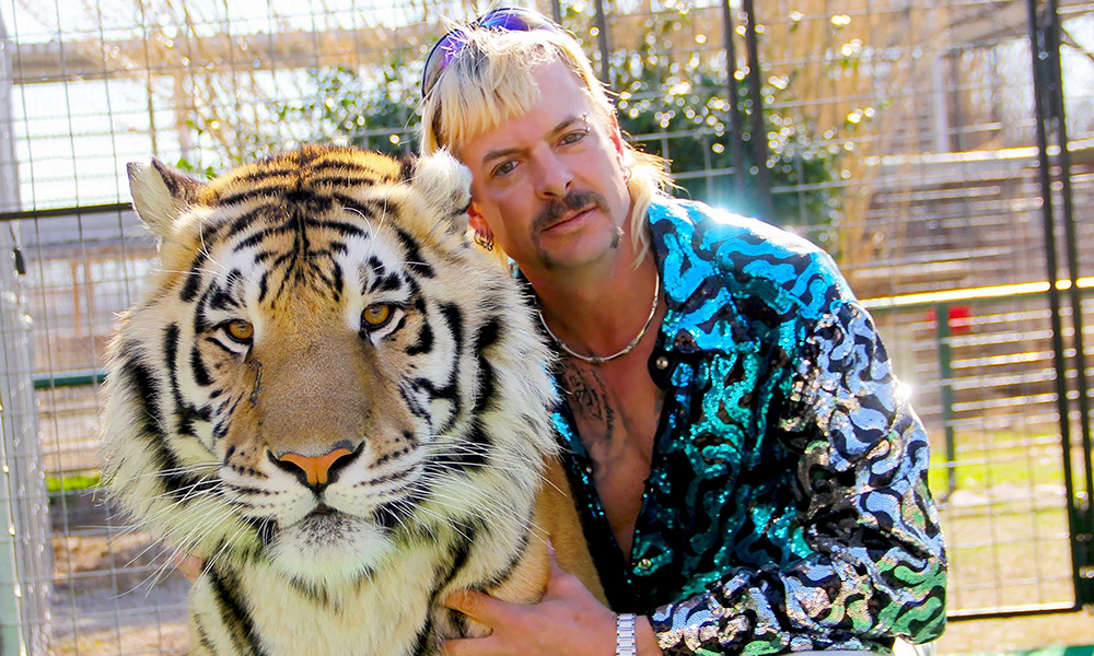 In this undated photo courtesy of Netflix shows Joseph “Joe Exotic” Maldonado-Passage with one of his tigers. —AFP