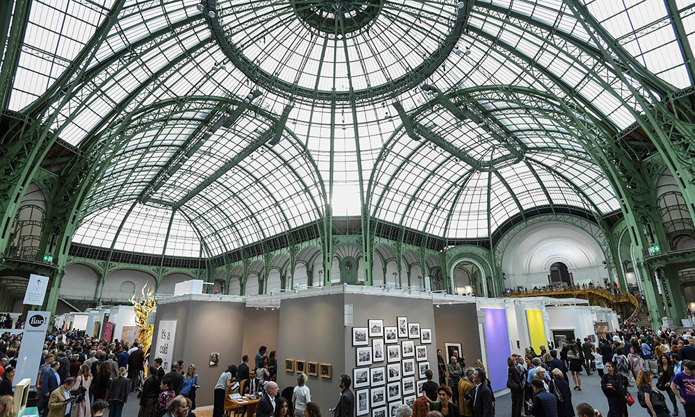This file photograph shows visitors at the Paris International Contemporary Art Fair (Foire Internationale d’Art Contemporain - FIAC) at The Grand Palais, in Paris. — AFP