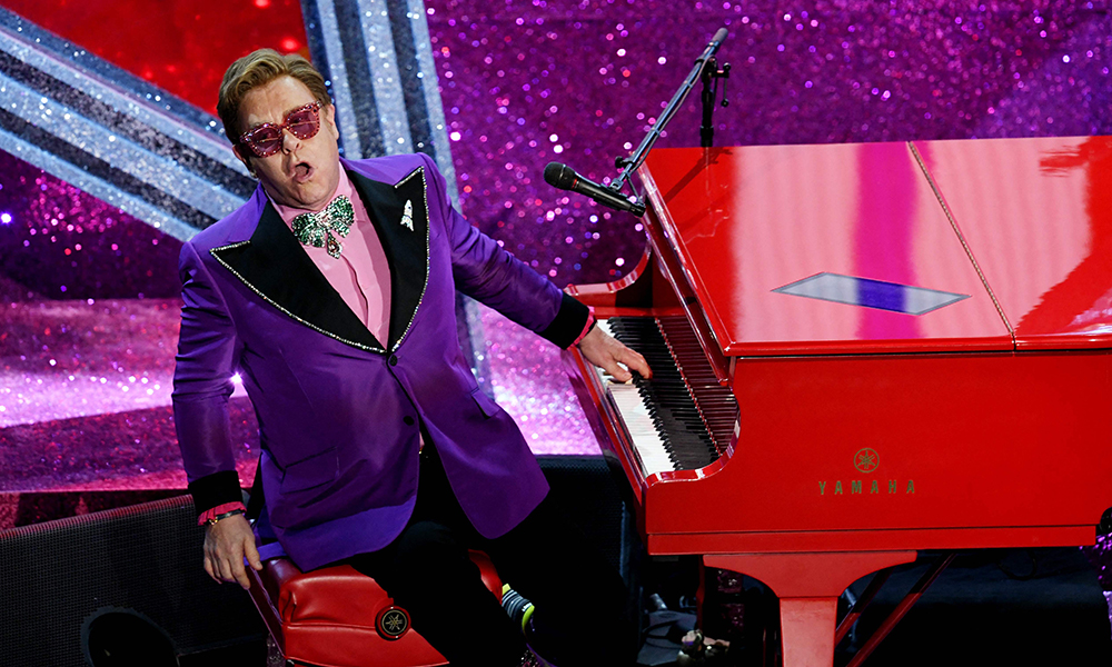 In this file photo Elton John performs onstage during the 92nd Annual Academy Awards at Dolby Theatre in Hollywood, California. — AFP