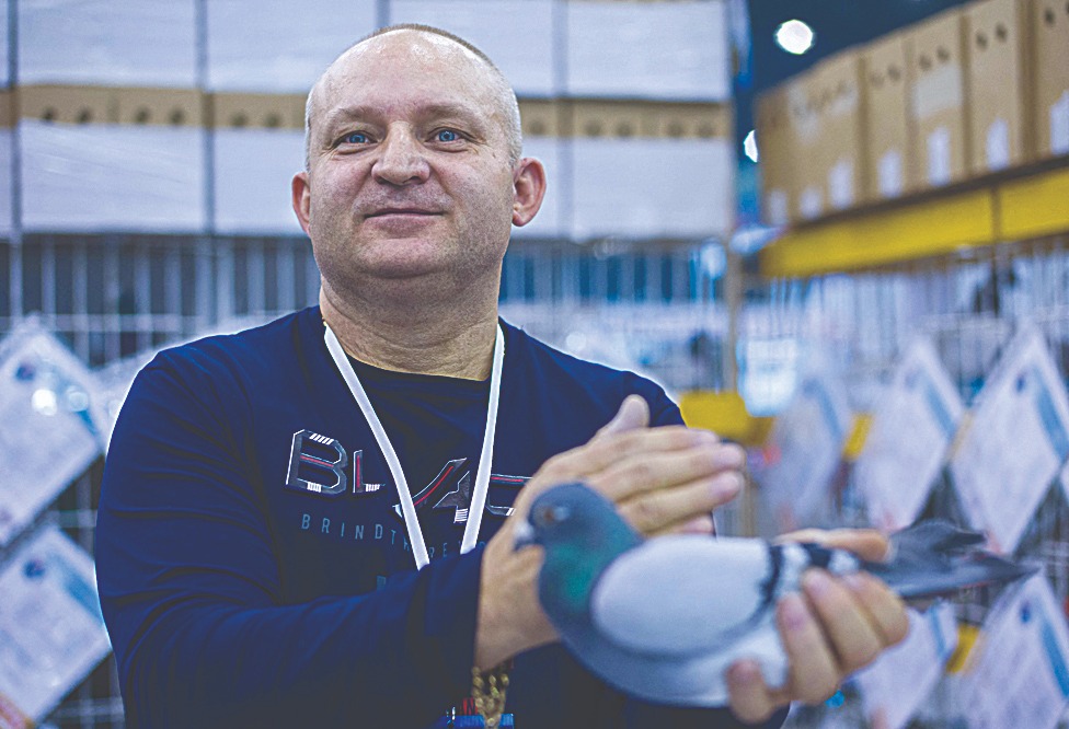 Zbigniew Oleksiak is pictured at the International Trade Fair of Racing Pigeons EXPOGolebie.