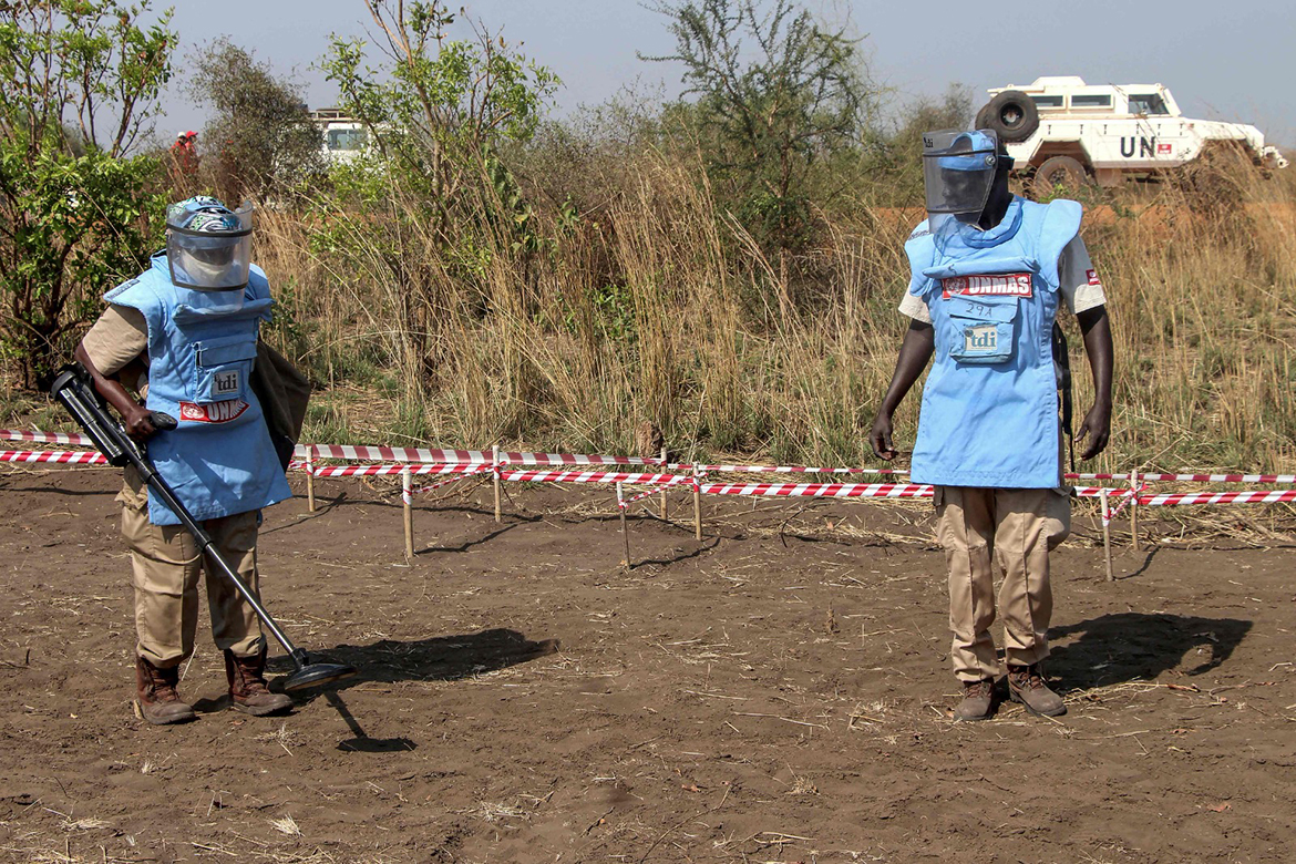 JUBA: Demining experts from the United Nations Mine Action Service (UNMAS) in protective gear as carry out a demining excercise on a mine field rigged up during the civil war at Gondokoro village in the capital Juba on January, 26, 2022.