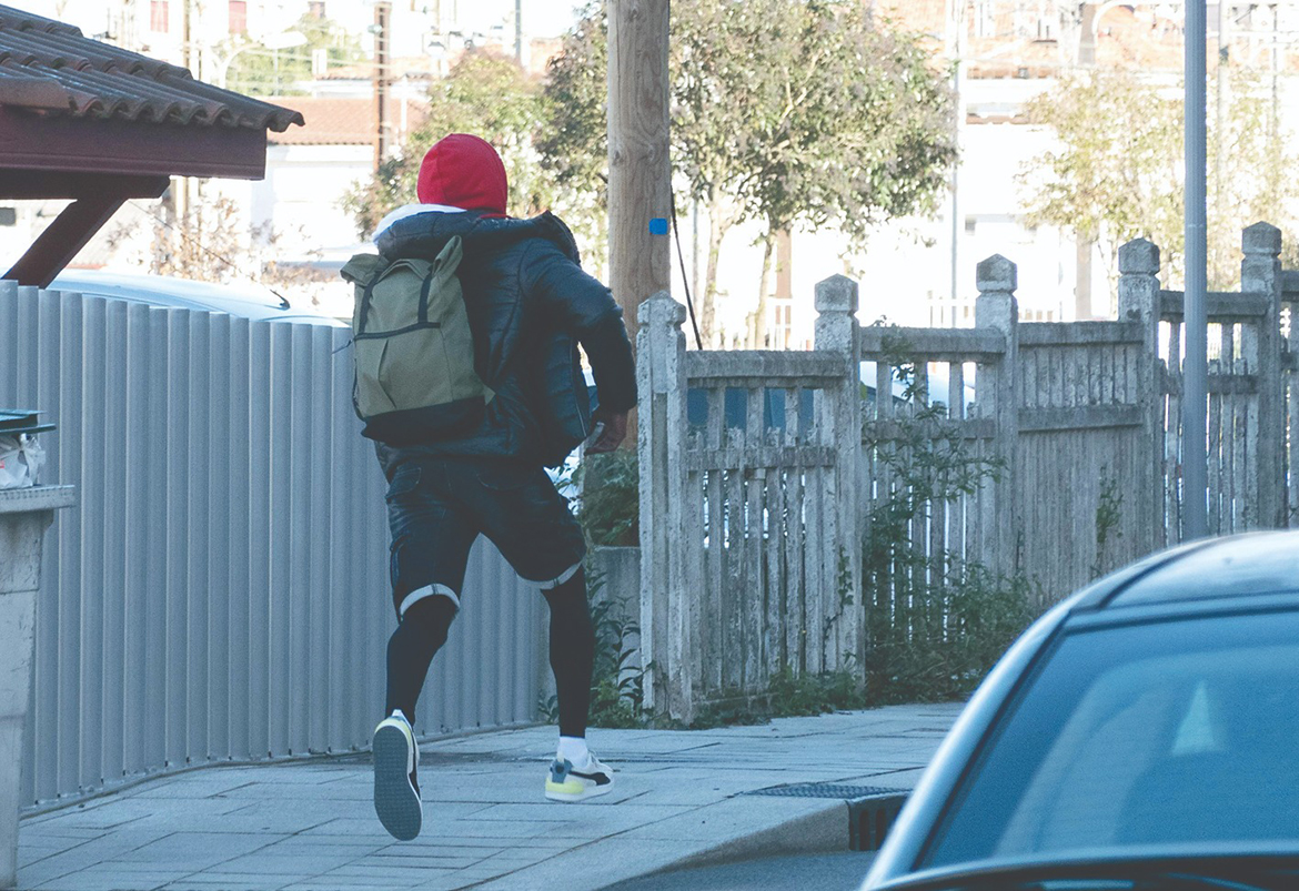 HENDAYE, France: A migrant escapes running after crossing the border between Irun (Spain) and Hendaye (France) in the French Basque city of Hendaye. – AFP