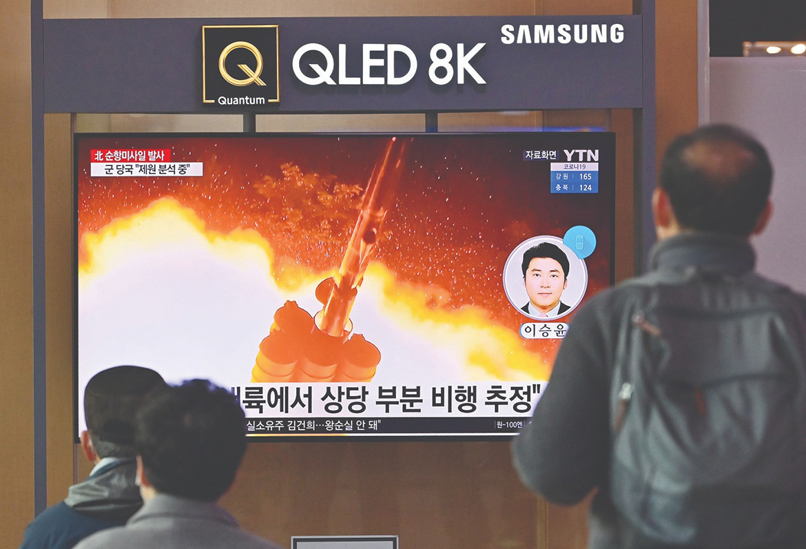 SEOUL: People watch a television screen showing a news broadcast with file footage of a North Korean missile test, at a railway station in Seoul Tuesday.