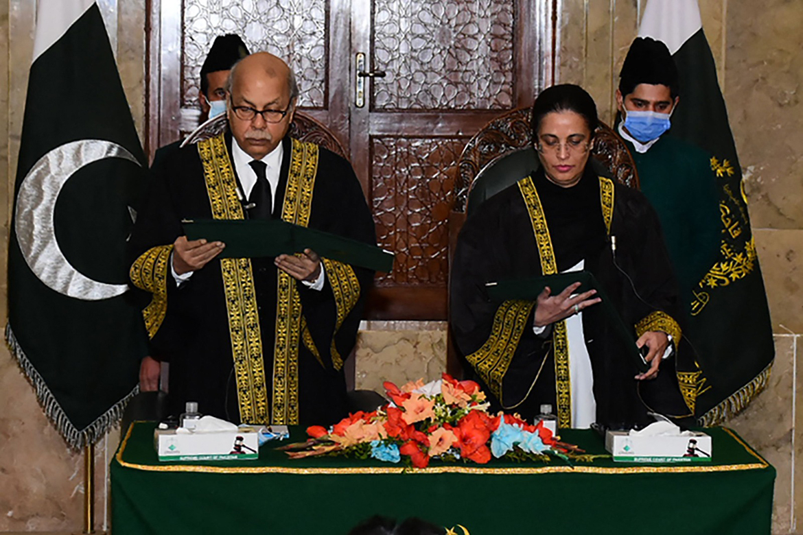 ISLAMABAD: Chief Justice Gulzar Ahmed administers the oath to justice Ayesha Malik as Pakistan's first female supreme court judge on Monday.