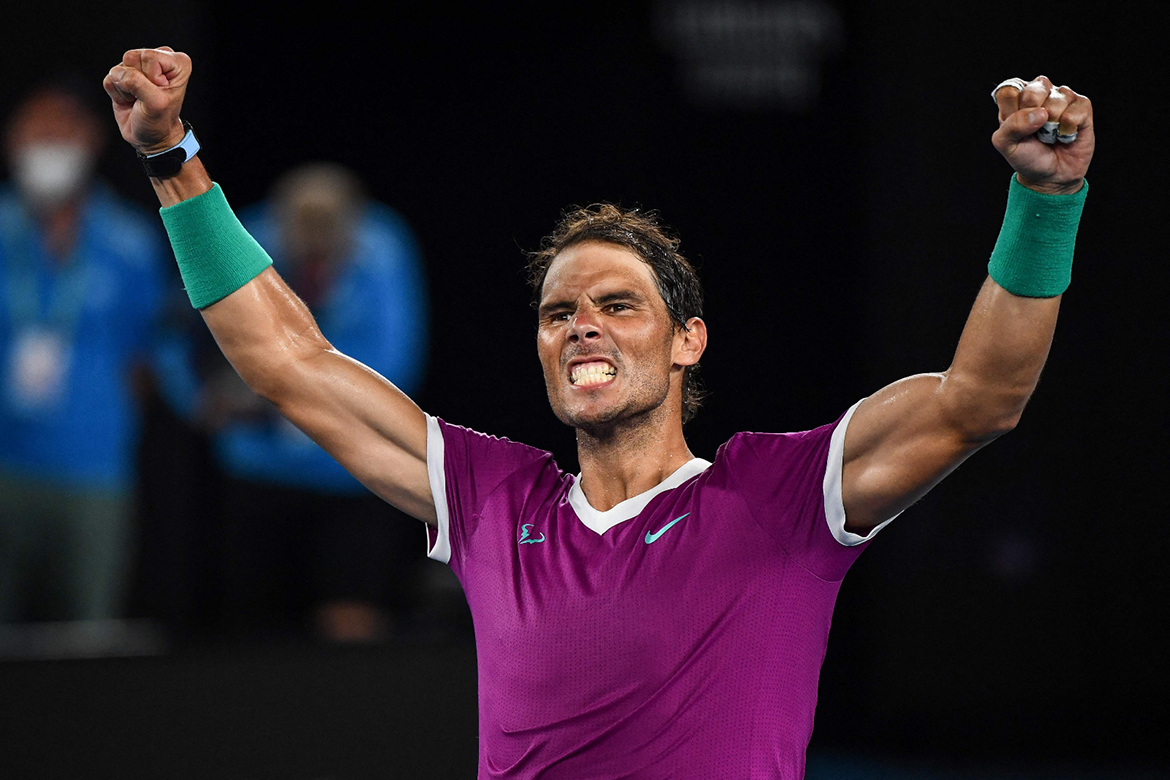 MELBOURNE: Spain's Rafael Nadal celebrates after victory against Italy's Matteo Berrettini during their men's singles semi-final match on day twelve of the Australian Open tennis tournament in Melbourne on January 28, 2022. – AFP