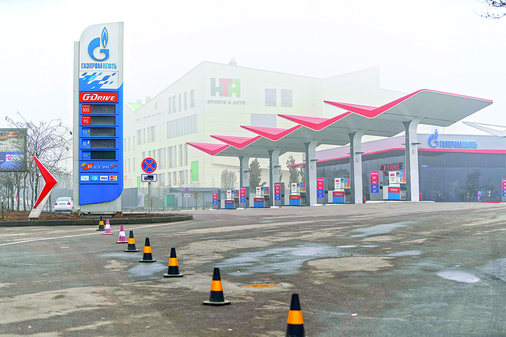 ALMATY: A photograph shows a closed gasoline station in Almaty yesterday after violence that erupted following protests over hikes in fuel prices.— AFP