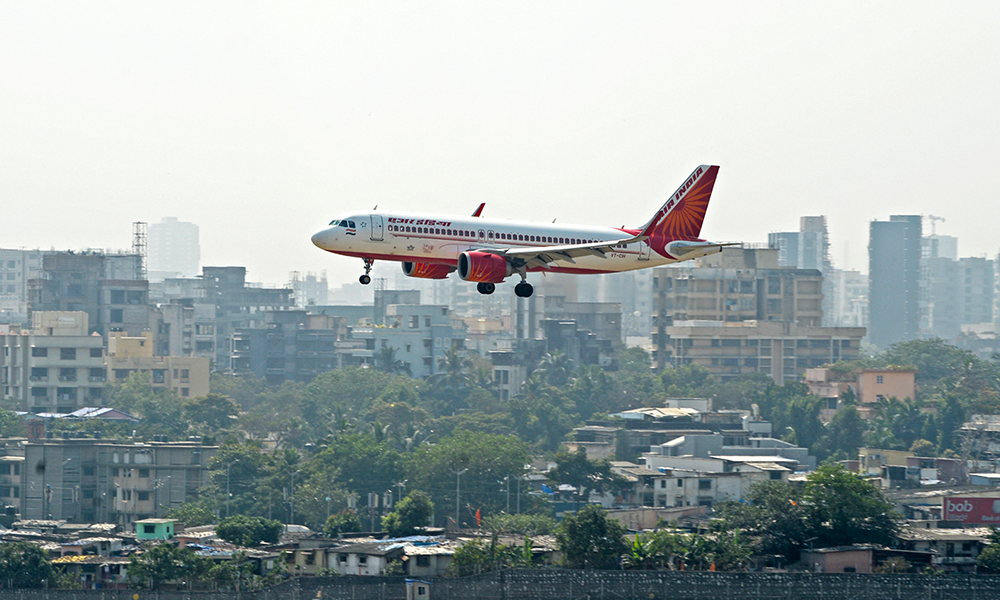 MUMBAI: An Air India aircraft prepares to land at the Chhatrapati Shivaji Maharaj International Airport in Mumbai. — AFP