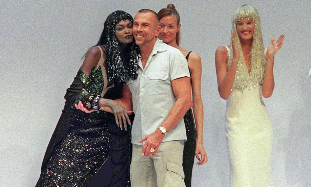 In this file photo, French designer Thierry Mugler hugs a model after his show in Paris during the Spring/Summer 2001 ready-to-wear collections. French designer Thierry Mugler, who reigned over fashion in the 1980s, died on January 23, 2022 at the age of 73 of ‘natural causes’. — AFP photos