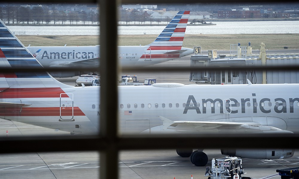 ARLINGTON: In this file photo, American Airline planes sit on the tarmac at Ronald Reagan Washington National Airport in Arlington, Virginia. — AFP