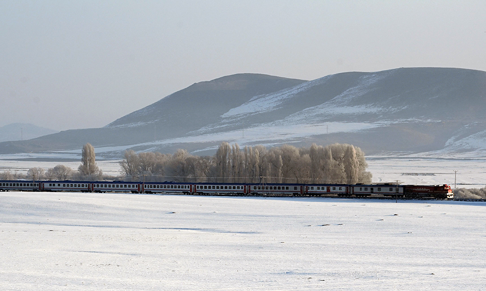 Photo shows the Eastern Express train passing through a snowy field near Kars. Festive garlands, red tablecloths and enticing bottles pop out the moment passengers clamber aboard the Eastern Express train before it glides off on an epic voyage across Turkey’s snow-capped plateaus along the Euphrates. Called Dogu Ekspresi in Turkish, the train offers one of the expansive country’s most coveted new experiences. — AFP photos