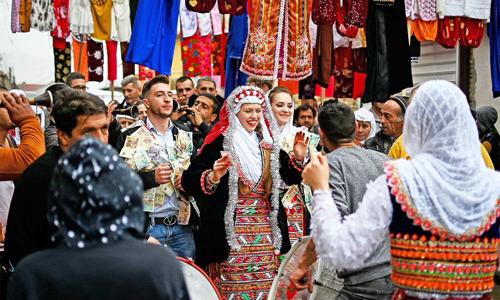 Bulgarian Pomak (Bulgarian speaking Muslims) bride Nefie Eminkova, 21 and her fiancee Schaban Kiselov, 24, dance during their wedding ceremony in the village of Ribnovo.