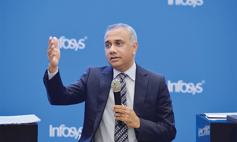 MUMBAI: Infosys chief executive and managing director Salil Parekh briefs the media yesterday.—AFP