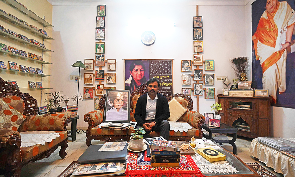 In this Gaurav Sharma, superfan of late Bollywood playback singer Lata†Mangeshkar, poses for pictures during an interview with AFP at his home museum where he has meticulously catalogued thousands of compact discs, films and books featuring the singer, in Meerut. — AFP
